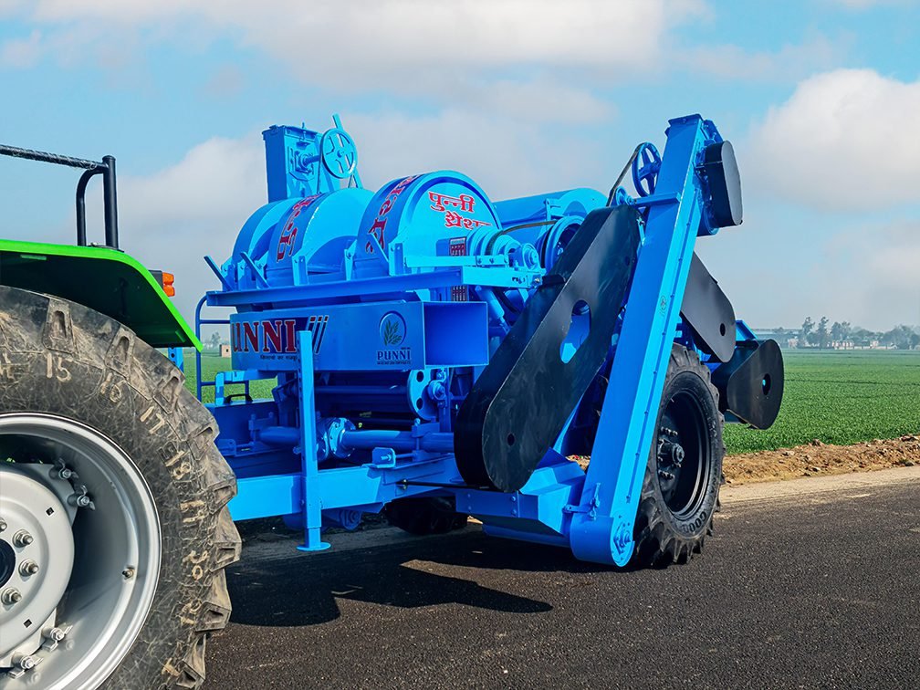 multi crop thresher with tractor attachment, front view.