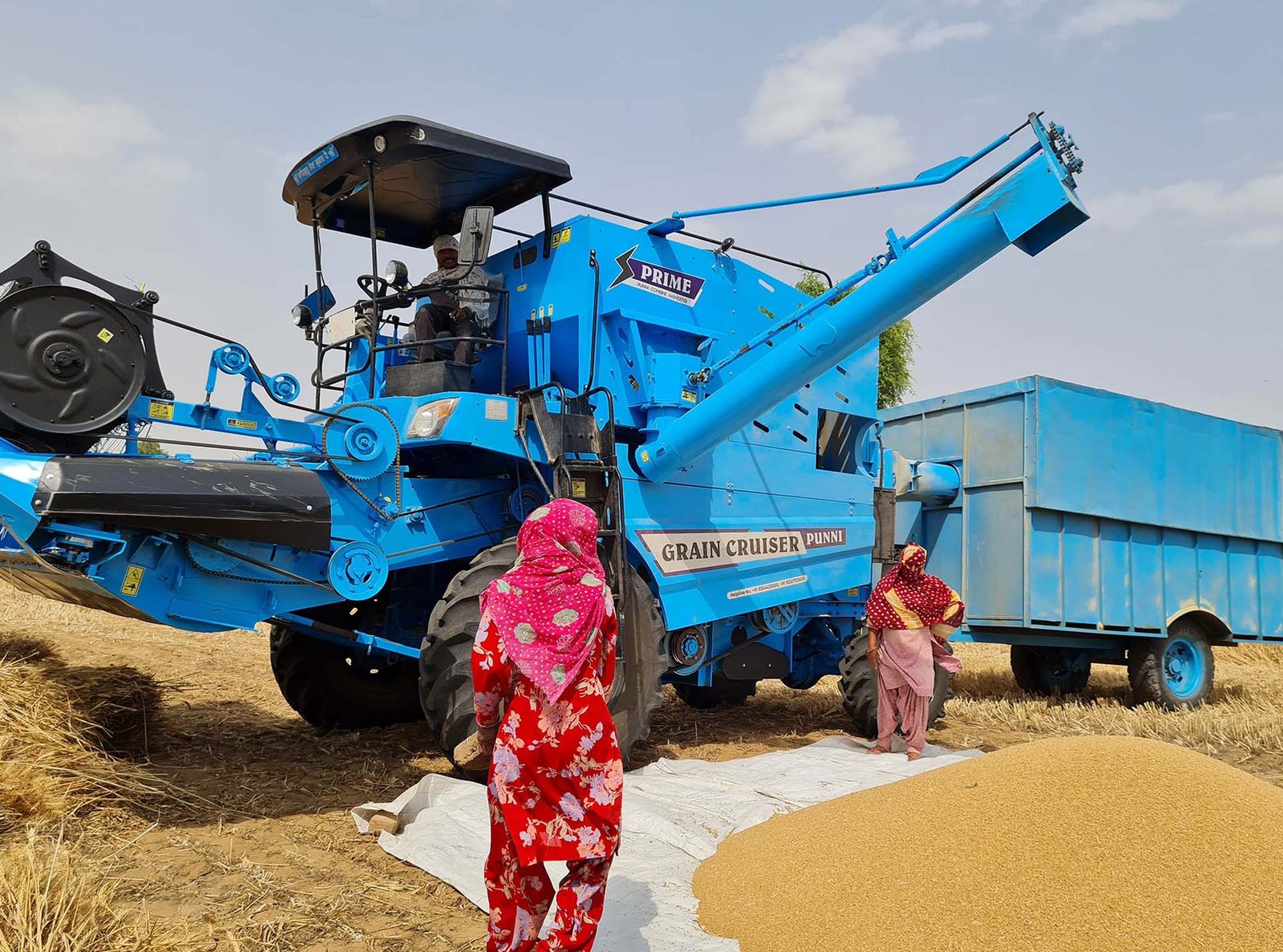 Grain Cruiser combine harvester unloading grain