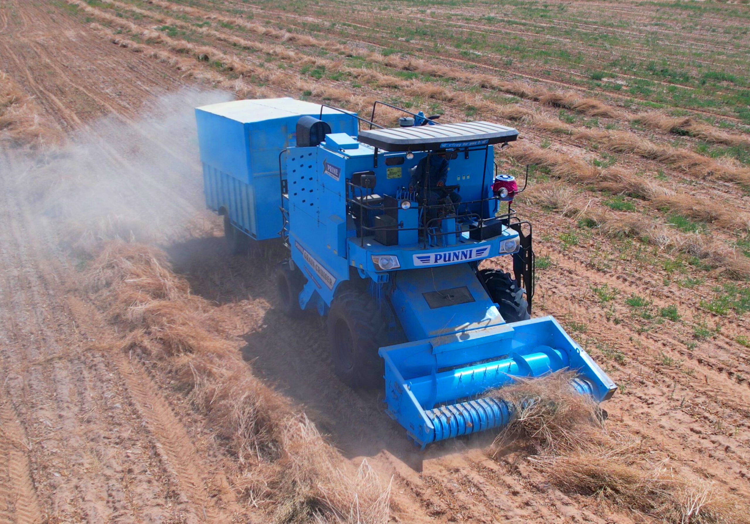 PUNNI Auto Picker Cutter attached to combine harvester